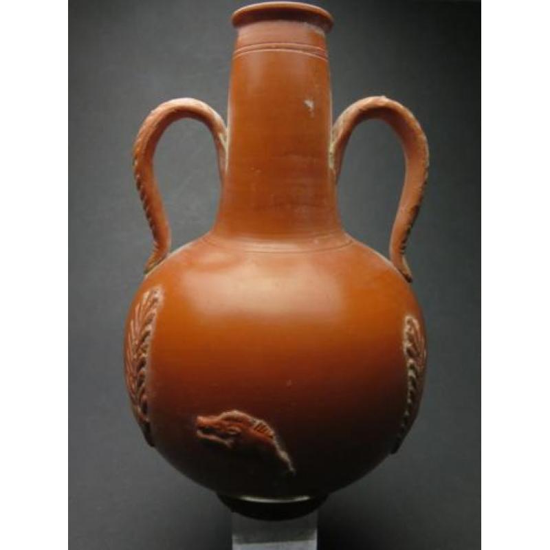 Roman Carthago sigilata bottle with boar and grain decoratio