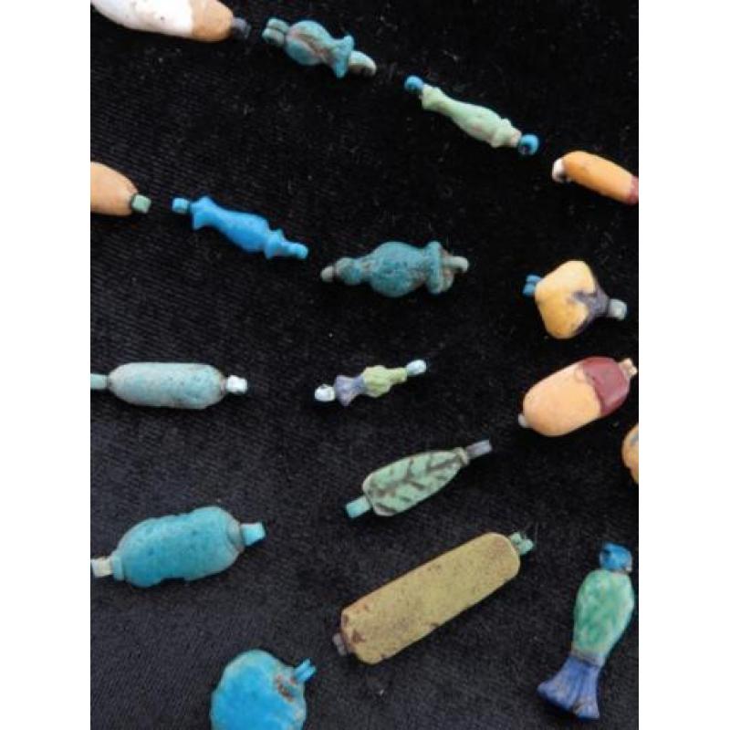 Collection of Egyptian faience Amarna flower and flower peta