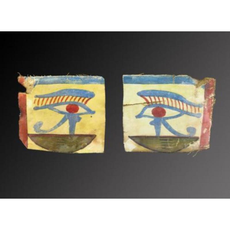 Two Egyptian Wedjat, Udjat or Horus eyes on stucco