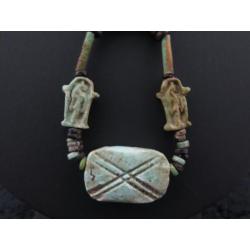 Necklace made of Egyptian faience mummy beads, 14 Shrine of