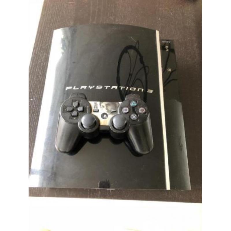 PS3 met meer dan 40 games en controller